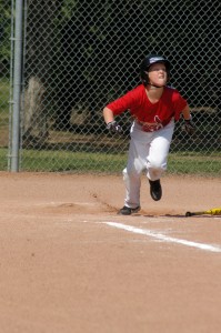 heading to first base